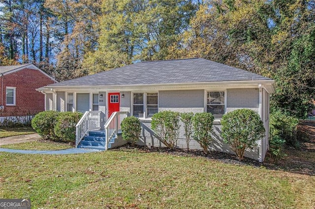 view of front of home with a front lawn