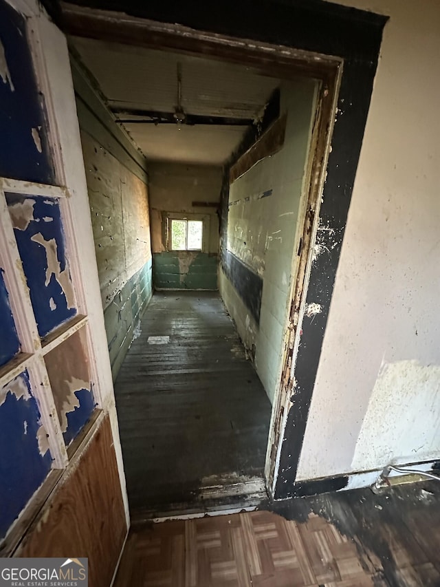 corridor featuring parquet floors