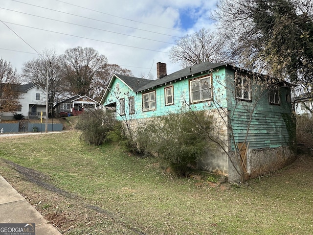 view of front of home with a front yard