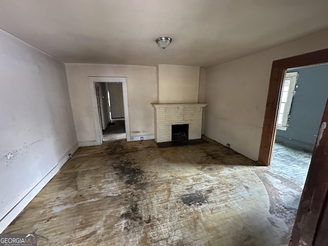 unfurnished living room featuring a fireplace