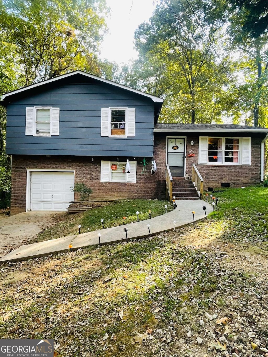 split level home featuring a garage