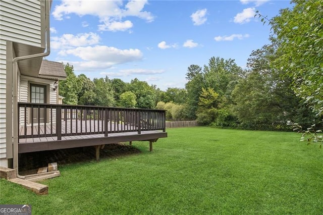 view of yard featuring a deck