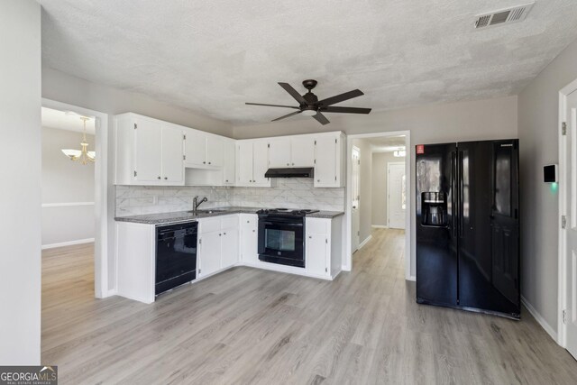 unfurnished living room with a fireplace, a textured ceiling, ceiling fan, and dark wood-type flooring