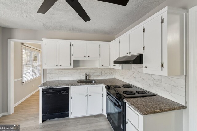 unfurnished room with a textured ceiling, ceiling fan, and dark wood-type flooring