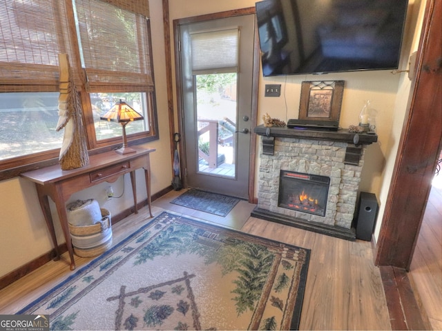 interior space featuring a fireplace and hardwood / wood-style flooring