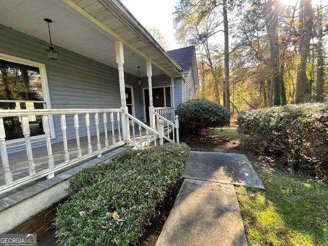 exterior space featuring covered porch