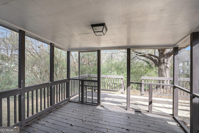 unfurnished sunroom with a wealth of natural light