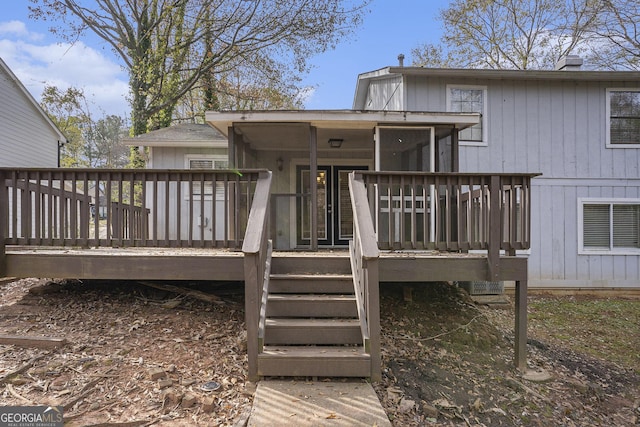 wooden terrace with a sunroom