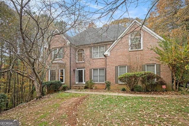 view of front of home with a front lawn