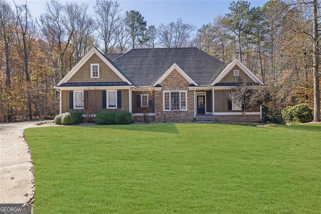 craftsman house featuring a front yard