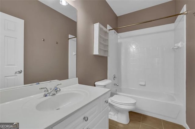 full bathroom featuring tile patterned flooring, vanity,  shower combination, and toilet