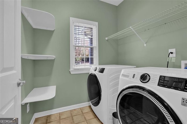 laundry area with independent washer and dryer