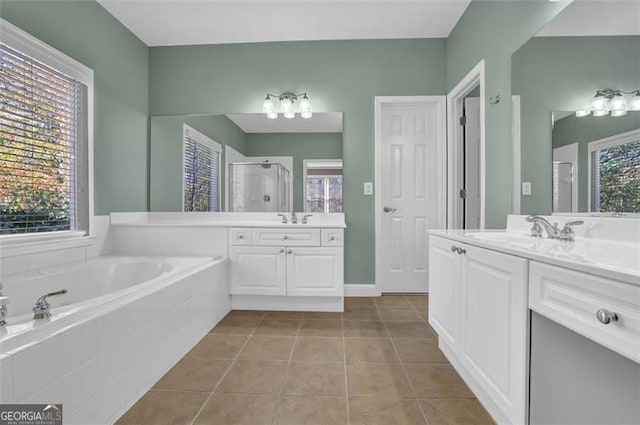 bathroom featuring separate shower and tub, tile patterned floors, and vanity