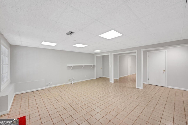 basement with a drop ceiling