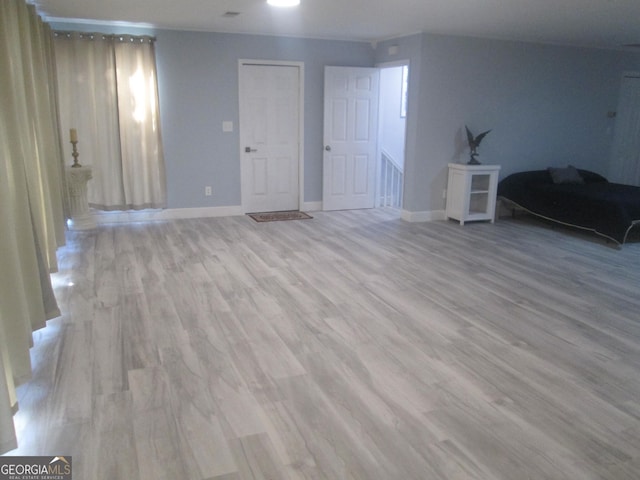 basement with light wood-type flooring