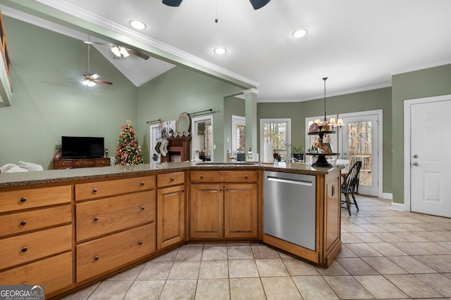 kitchen with sink, stainless steel dishwasher, crown molding, decorative light fixtures, and light tile patterned floors