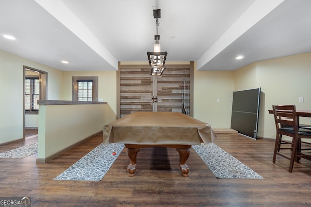 dining space featuring hardwood / wood-style flooring and pool table