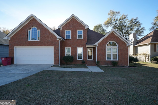 front facade featuring a front lawn and a garage