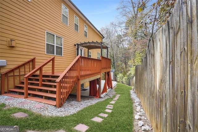 back of property featuring a wooden deck