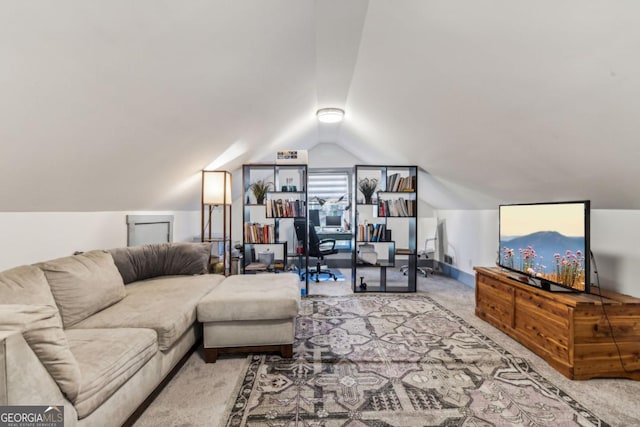 living room featuring carpet flooring and lofted ceiling