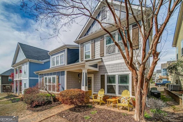 view of front of home featuring central AC unit