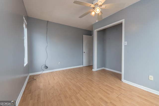 interior space with light wood-type flooring and ceiling fan