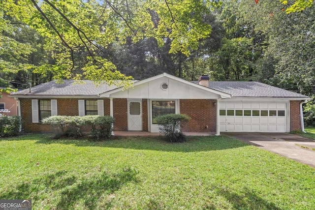 single story home featuring a garage and a front yard