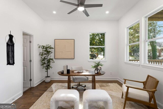 home office featuring ceiling fan and dark hardwood / wood-style flooring