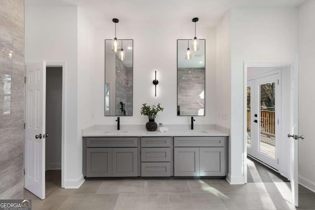 bathroom with tile patterned floors and vanity