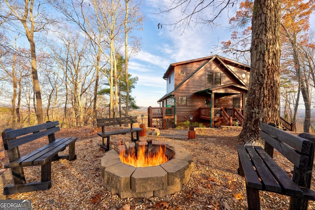 exterior space featuring a fire pit