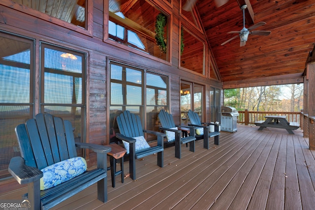 deck featuring grilling area and ceiling fan