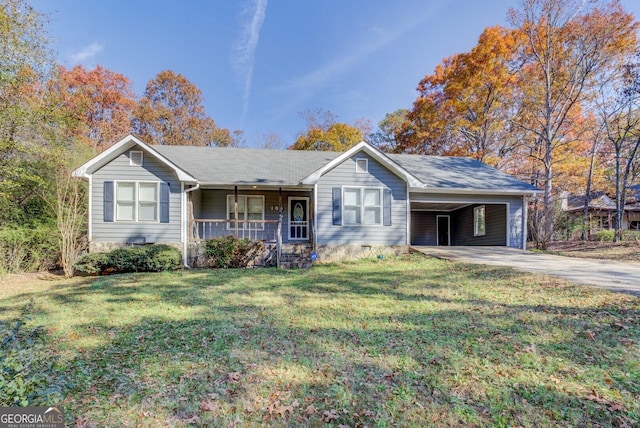 single story home featuring covered porch, a carport, and a front yard