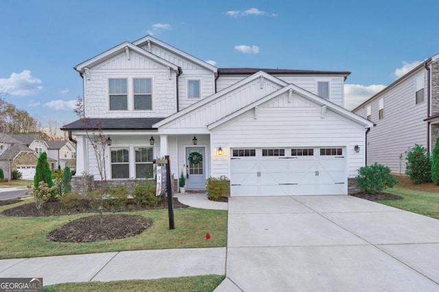 view of front facade with a front lawn and a garage