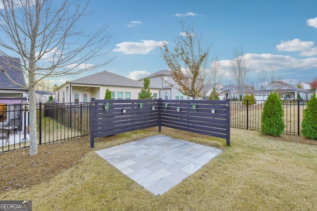 exterior space with a lawn and a patio