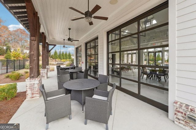 view of patio / terrace featuring ceiling fan