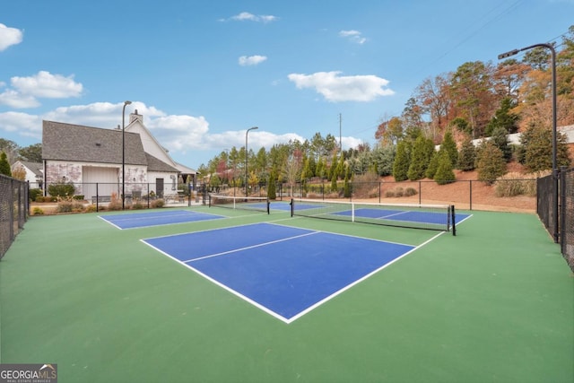 view of tennis court with basketball court