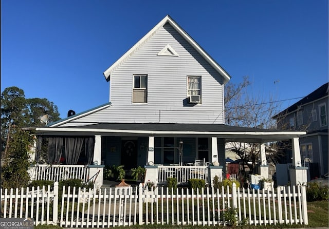 view of front of property featuring covered porch