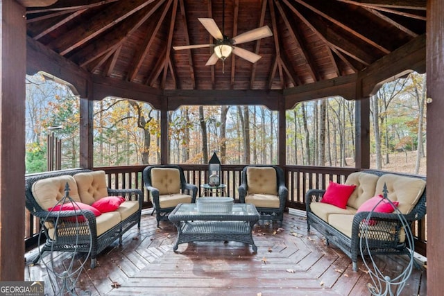 wooden deck with a gazebo, ceiling fan, and outdoor lounge area