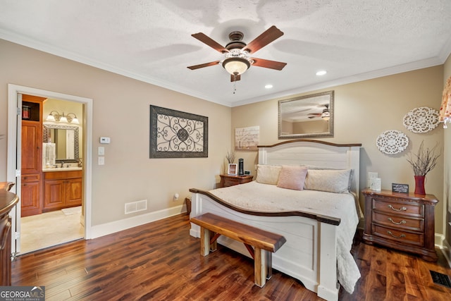 bedroom featuring ornamental molding, wood finished floors, recessed lighting, baseboards, and connected bathroom