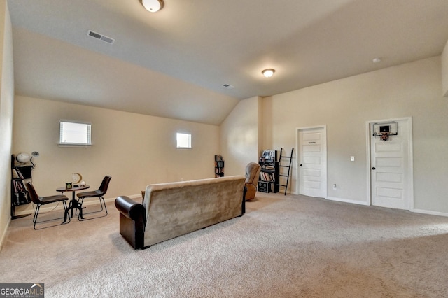 living room with light carpet and lofted ceiling