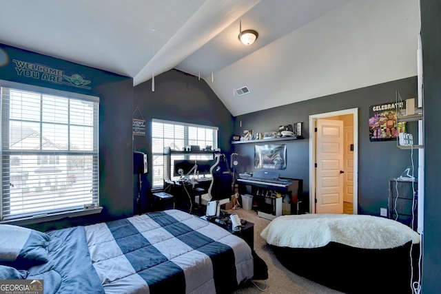 carpeted bedroom featuring vaulted ceiling