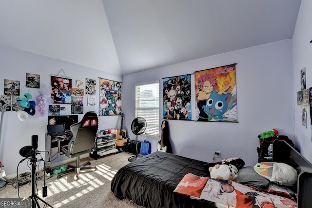 bedroom with carpet flooring and vaulted ceiling