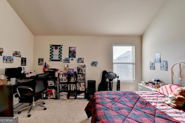 carpeted bedroom featuring vaulted ceiling