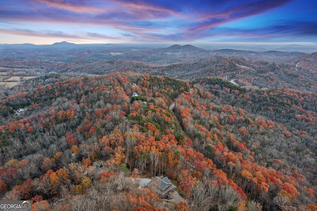 aerial view at dusk with a mountain view