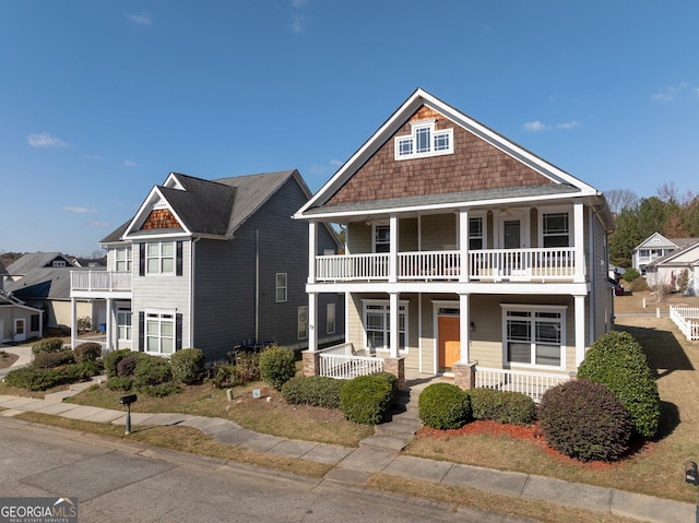 view of front facade featuring a balcony and a porch