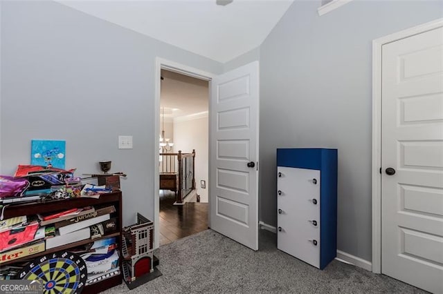 interior space featuring wood-type flooring and ornamental molding