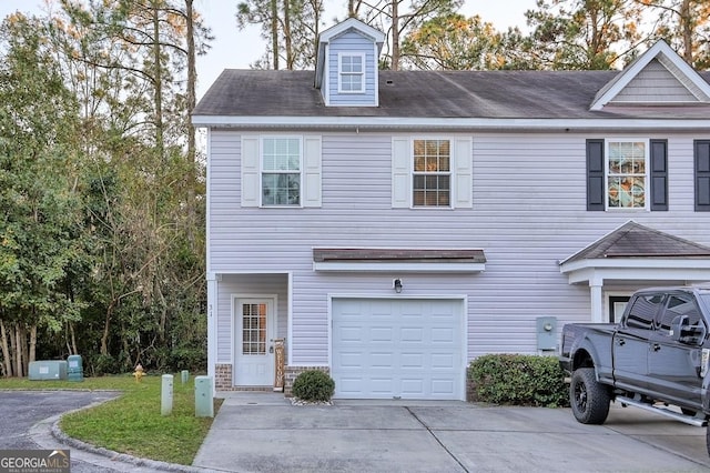 view of front of home with a garage