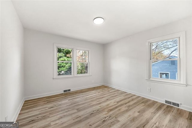 empty room featuring light hardwood / wood-style floors