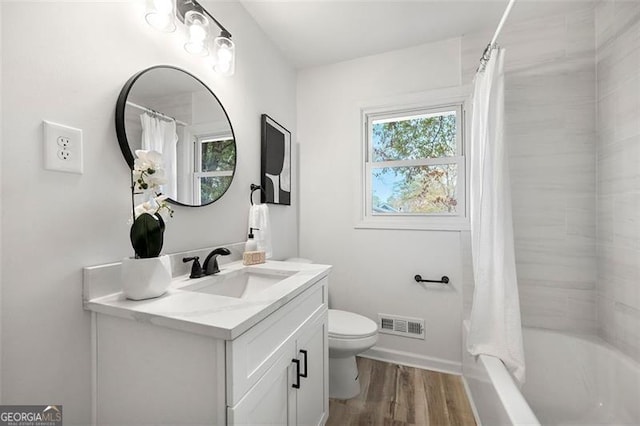 full bathroom with toilet, vanity, shower / tub combo, and hardwood / wood-style flooring