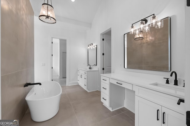 bathroom with a soaking tub, two vanities, a sink, and tile patterned flooring